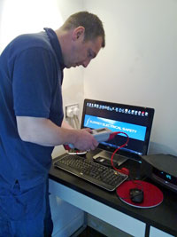 Engineer performing PAT tests